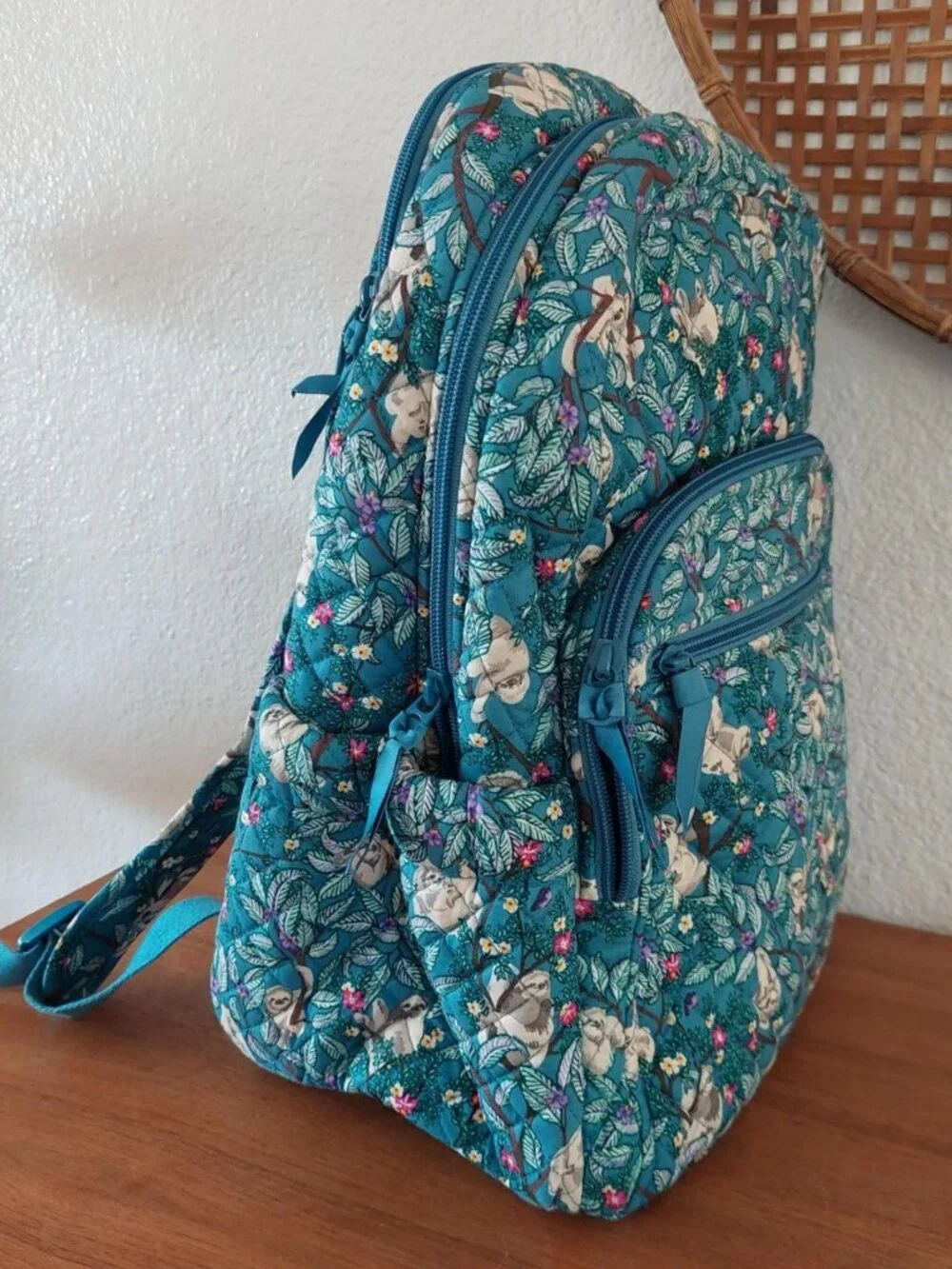 vera bradley Sloth backpack with sloths and flowers on a teal background #sloth
